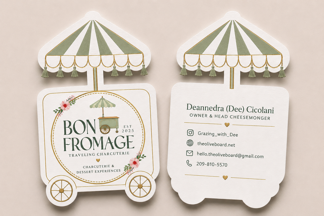 Two business cards with an umbrella design on a beige background