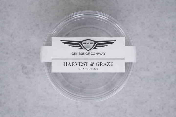 Clear container with a label on a gray background