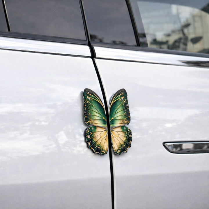 Green butterfly decal on a car door